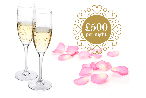 Champagne glasses and rose petals - £500 per night